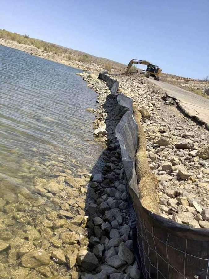 Silt curtain and riprap at the water’s edge
