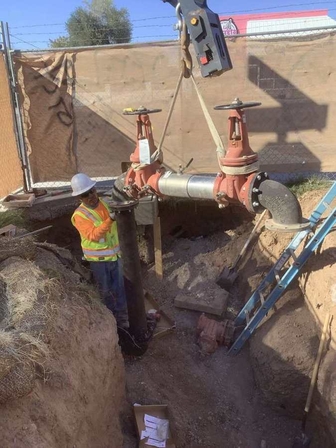 Setting a fire service backflow assembly