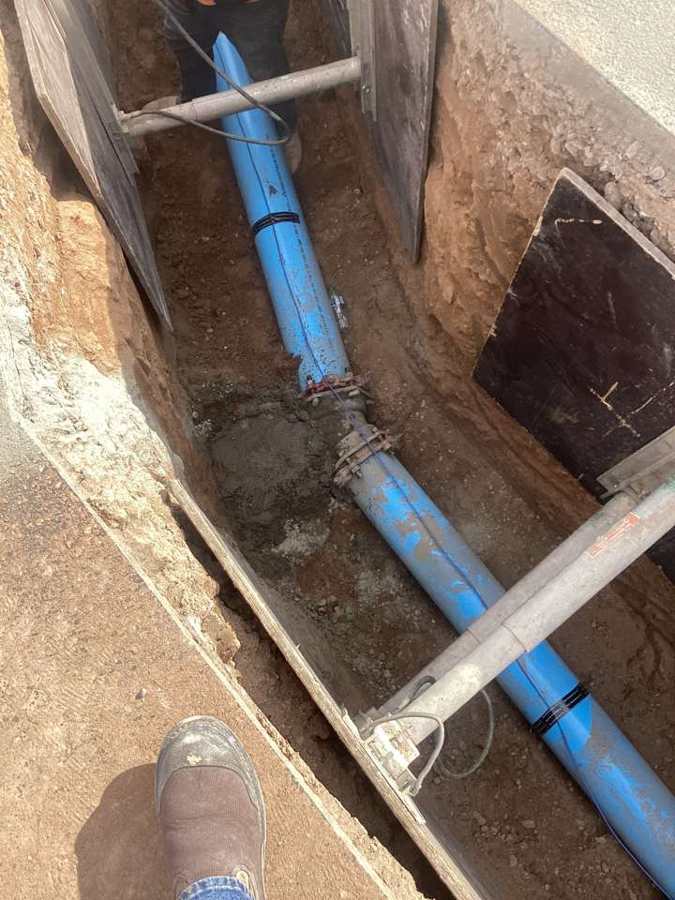 New C900 water main tied in inside a shored trench
