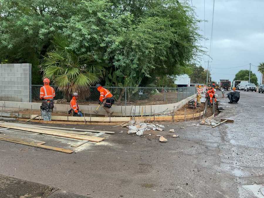 Crew forming a curb return