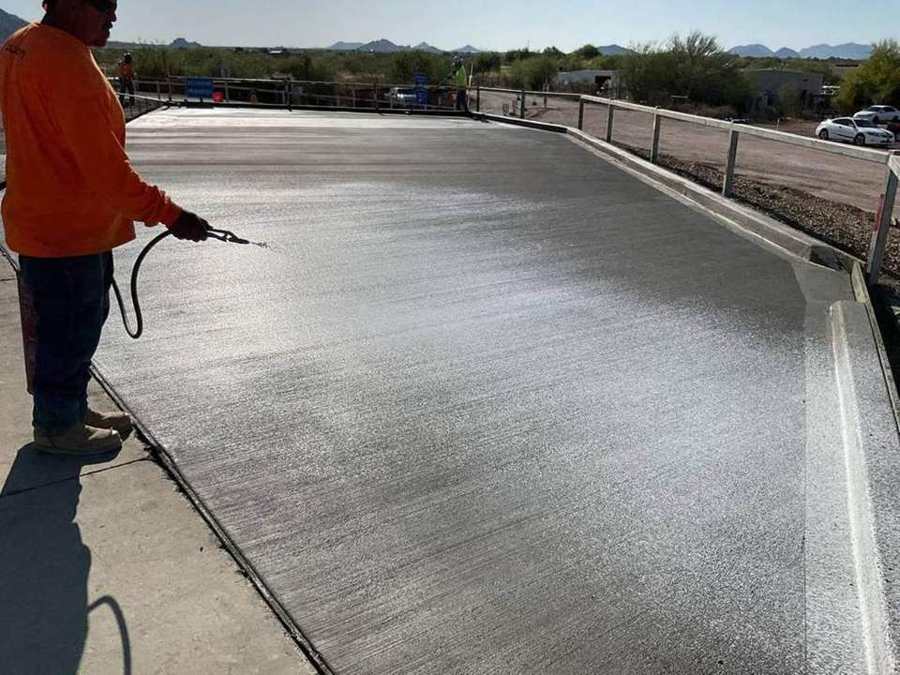 Spraying cure on a new slab