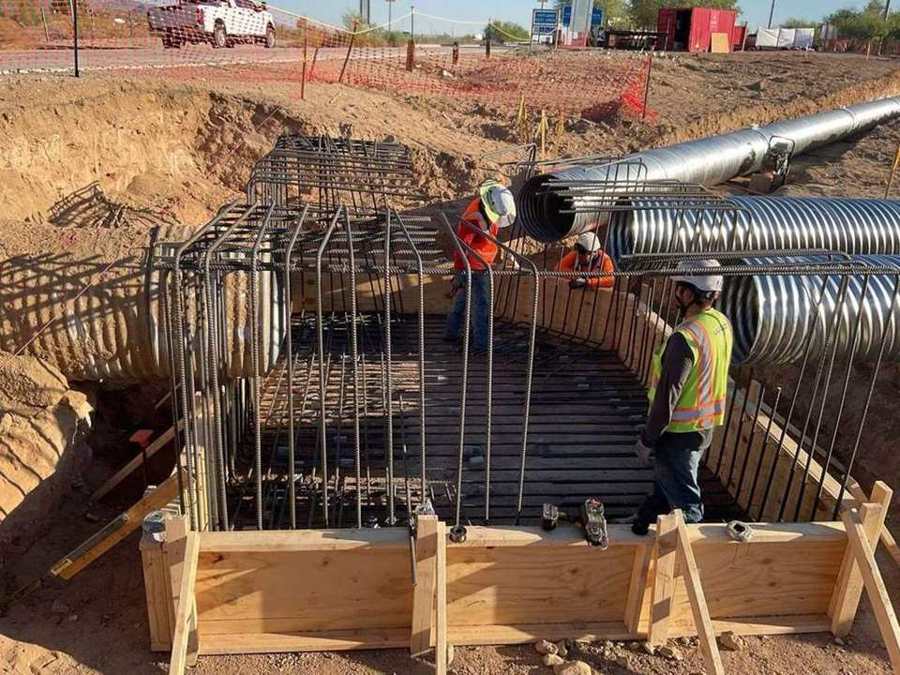 Crew tying headwall rebar