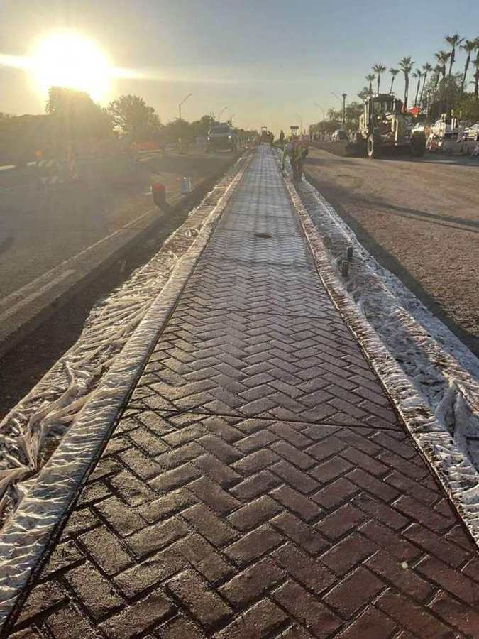 Stamped herringbone median at sunrise