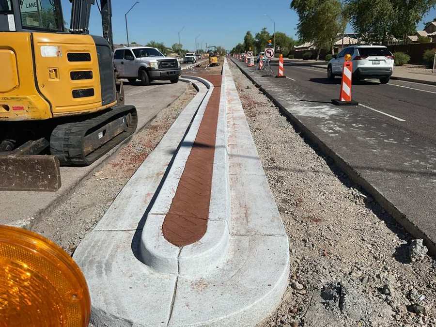 New median curb with stamped infill