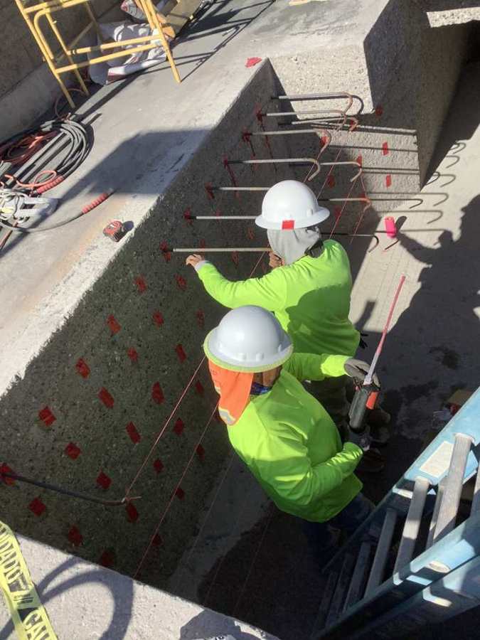 Setting dowels along an existing channel wall
