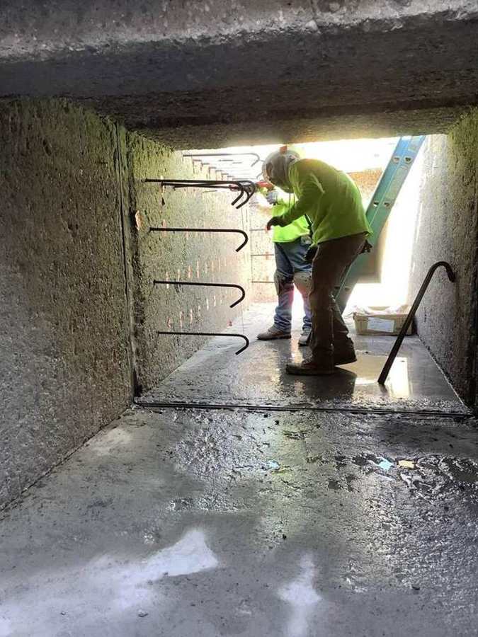 Drilling and doweling new rebar into an existing channel wall
