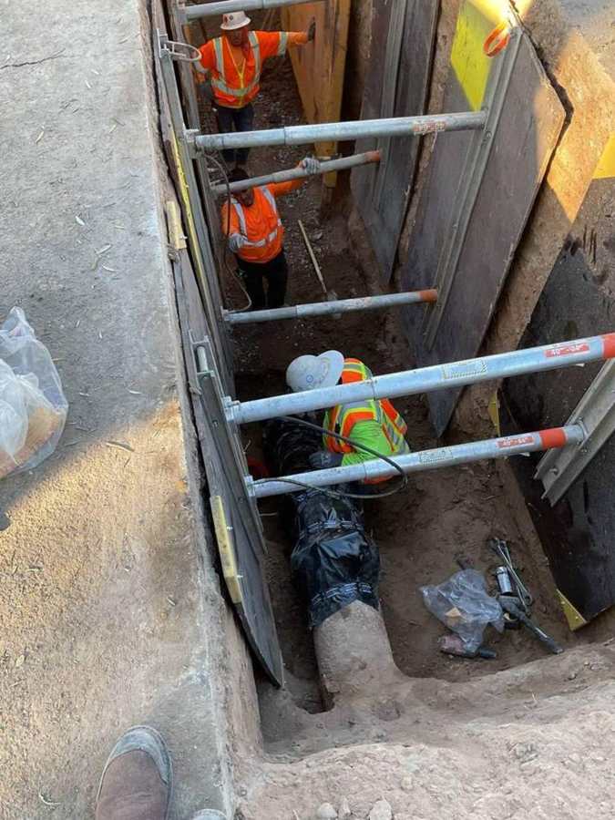 Pipe work in a shored trench
