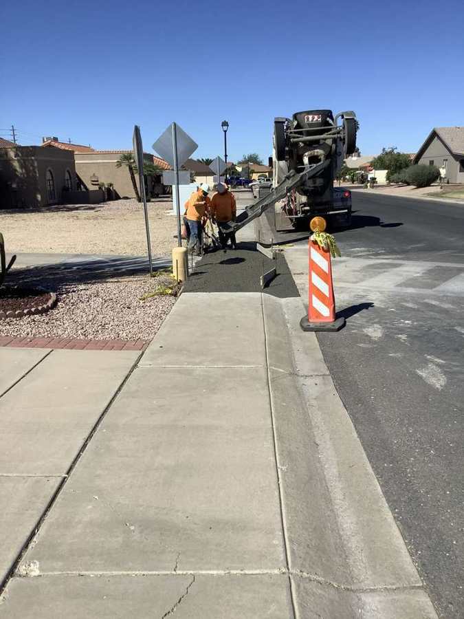 Sidewalk pour off the mixer chute