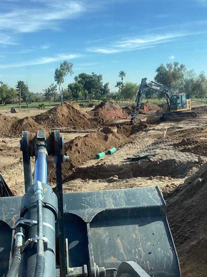 Gate valve tie-in inside a shored trench